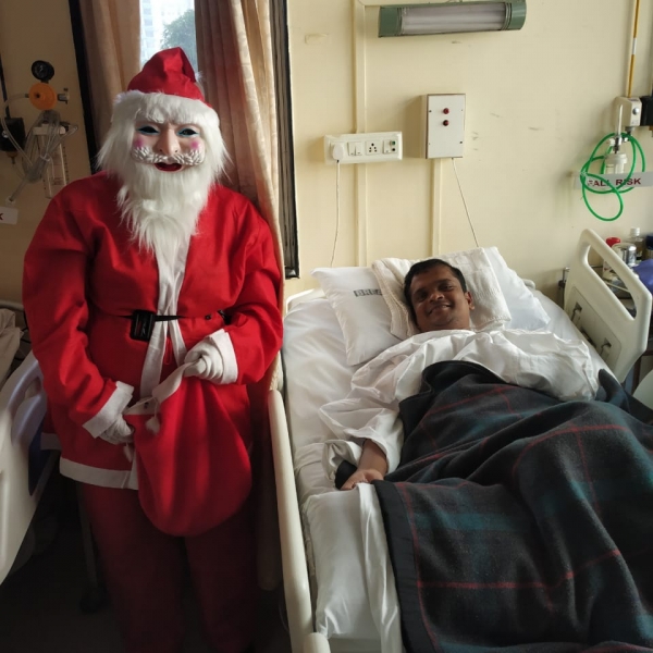 Santa Greeting patient’s in in-patient area.